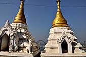 Myanmar - Sagaing, Shwe-kyet-kay a pagoda on a steep bank of the River close to the two parallel bridges linking Sagaing and Amarapura. 